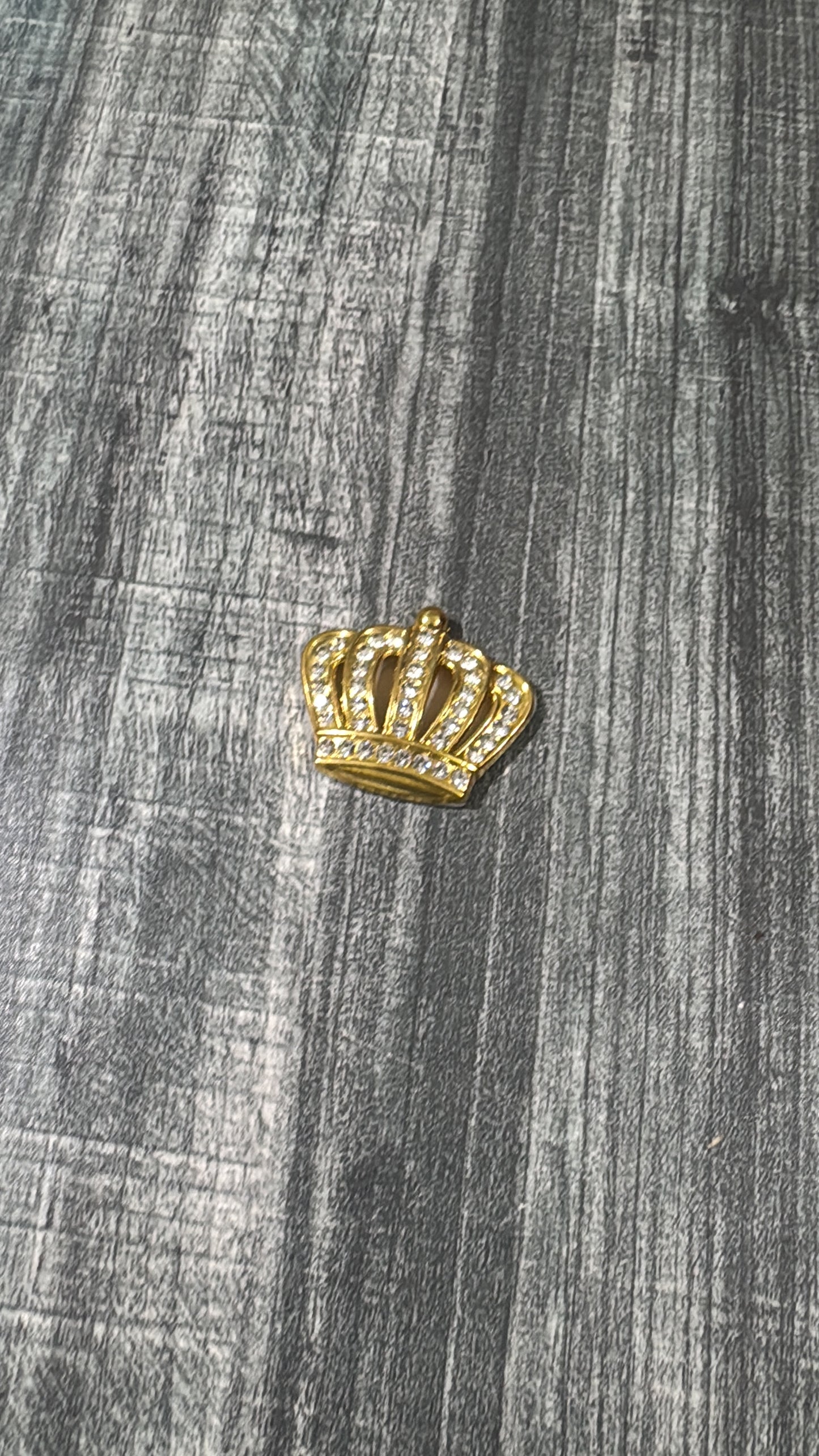 Taj metal logo